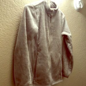 A warm cozy jacket never been worn before